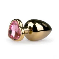 Analplug aus Metall in Gold mit rosa Herzkristall und konisch zulaufender Spitze