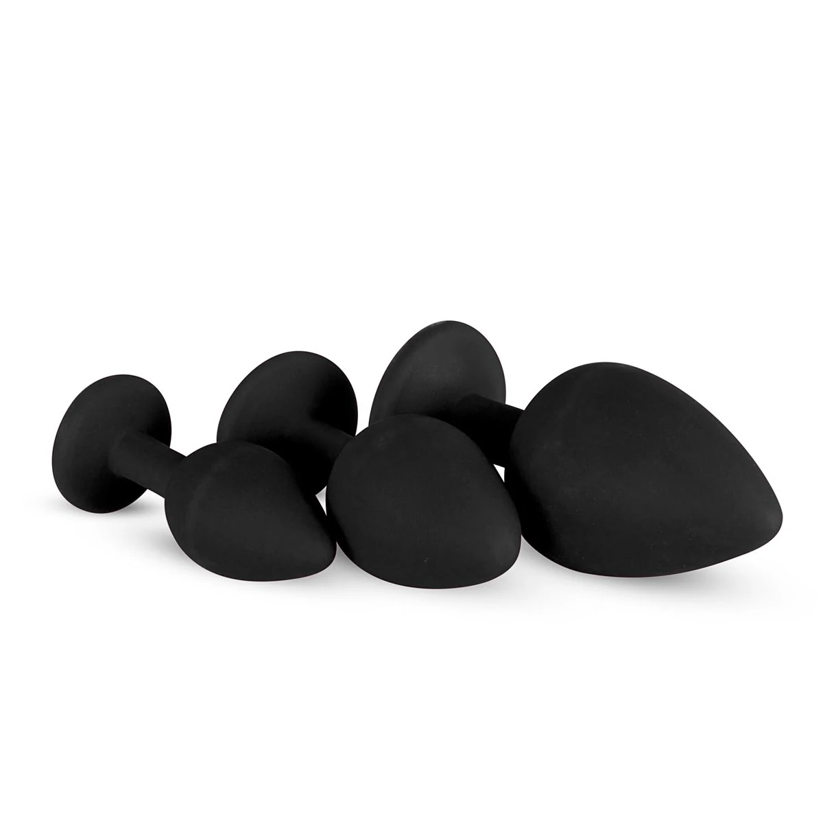 Drei schwarze Analplugs mit flacher Basis und eingesetztem Stein