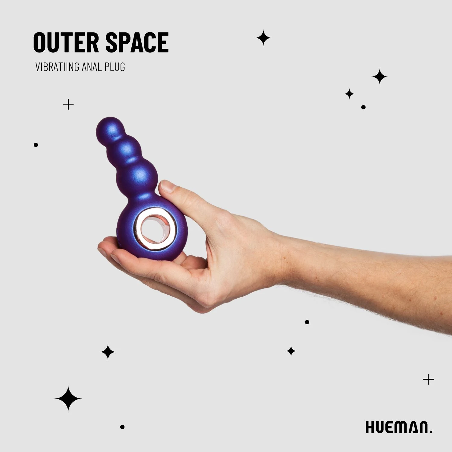 Lila Analplug von Hueman mit gebogenem Schaft zur Prostatastimulation