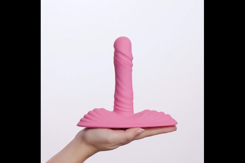 Rosa Thrusting Pad Vibrator von Teazers mit stabiler Basis